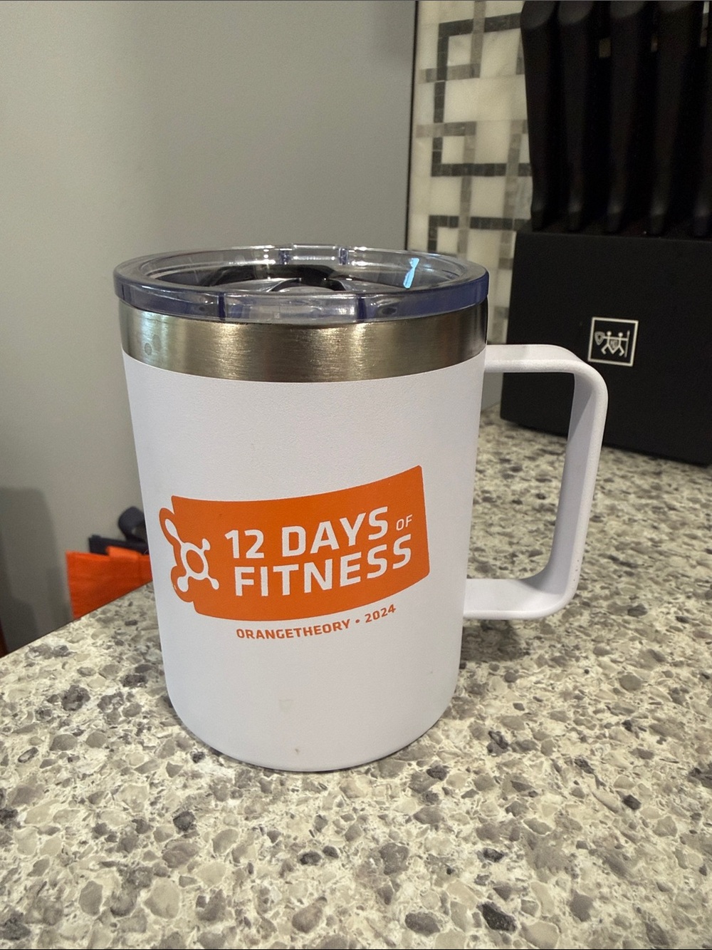Orangetheory White and Orange 12 Days of Fitness Travel Mug with Handle